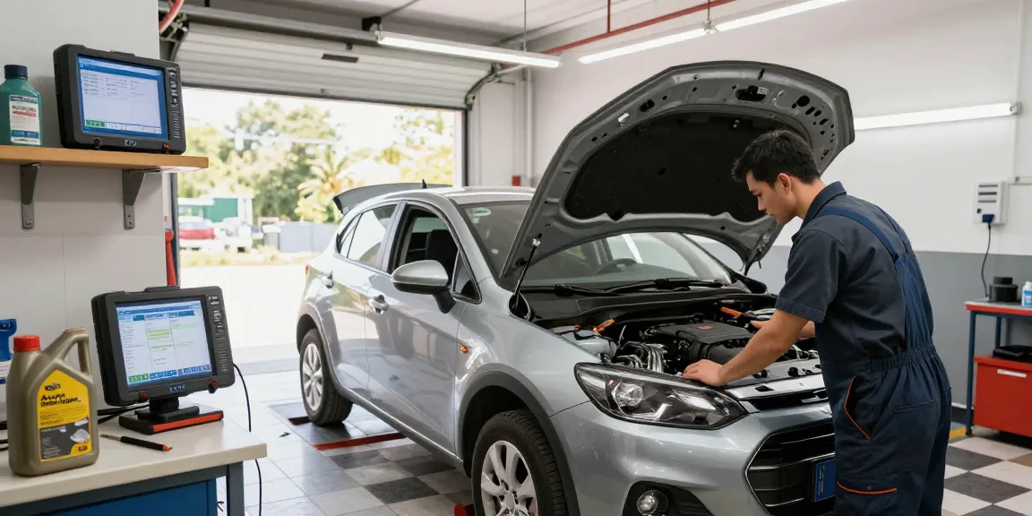 Mechanic inspecting engine to address issues of Auto consuma troppo in a well-equipped garage.